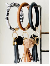 Load image into Gallery viewer, Key Chain Wristlet with Pom
