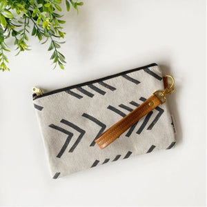 Wristlet with strap